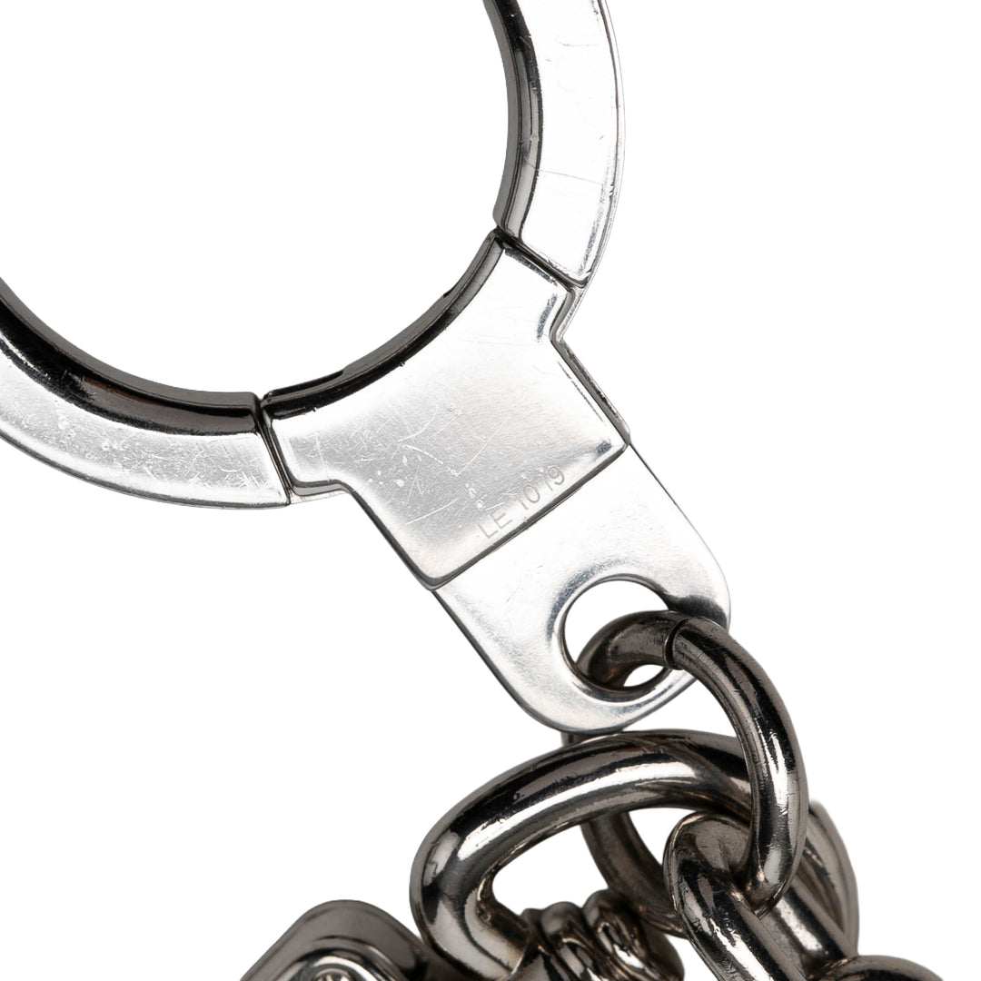 Louis Vuitton Porte-clés Stainless Steel LV Initials And Bijou de Argenté – vue 4 – GABY PARIS