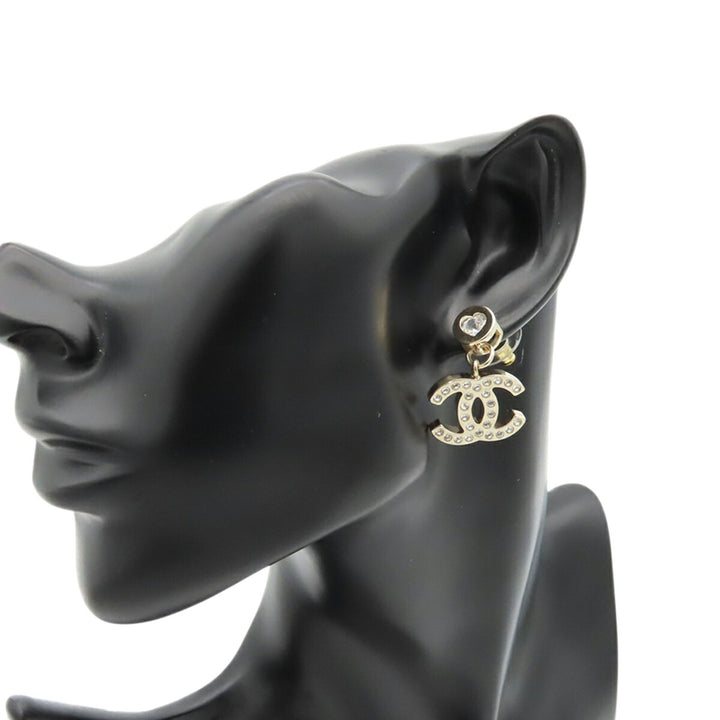 Chanel CC plaqué Rhinestone Heart fermoir poussette Boucles d’oreilles – GABY PARIS Authentique