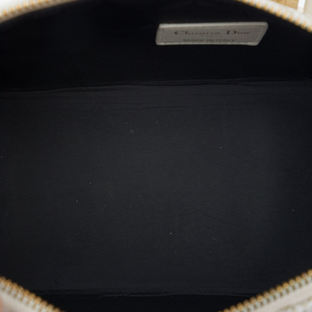 Dior Technical de Jouy DiorTravel Nomad Pochette Moyen Doré – vue 4 – GABY PARIS