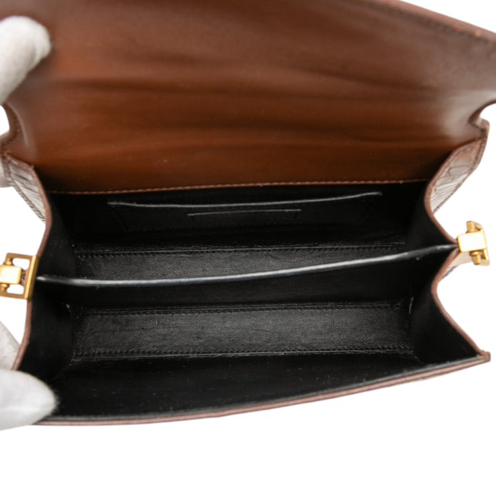 Saint Laurent Mini Croc embossé Cuir de veau Monogram Cassandra sac à anse supérieure