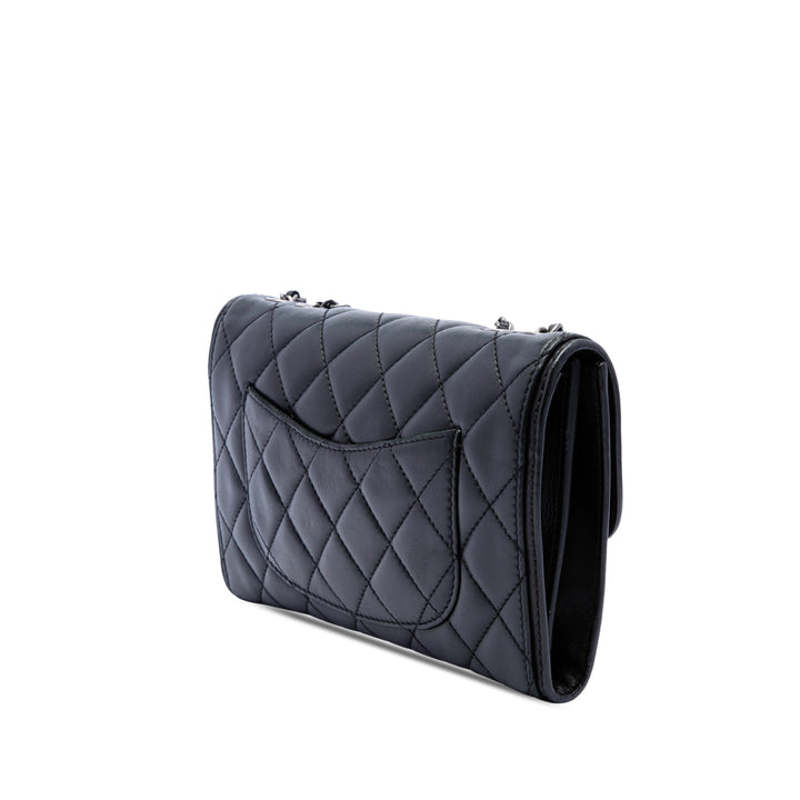 Matelassé Citizen Zippé à rabat Petit Cuir d'agneau Noir