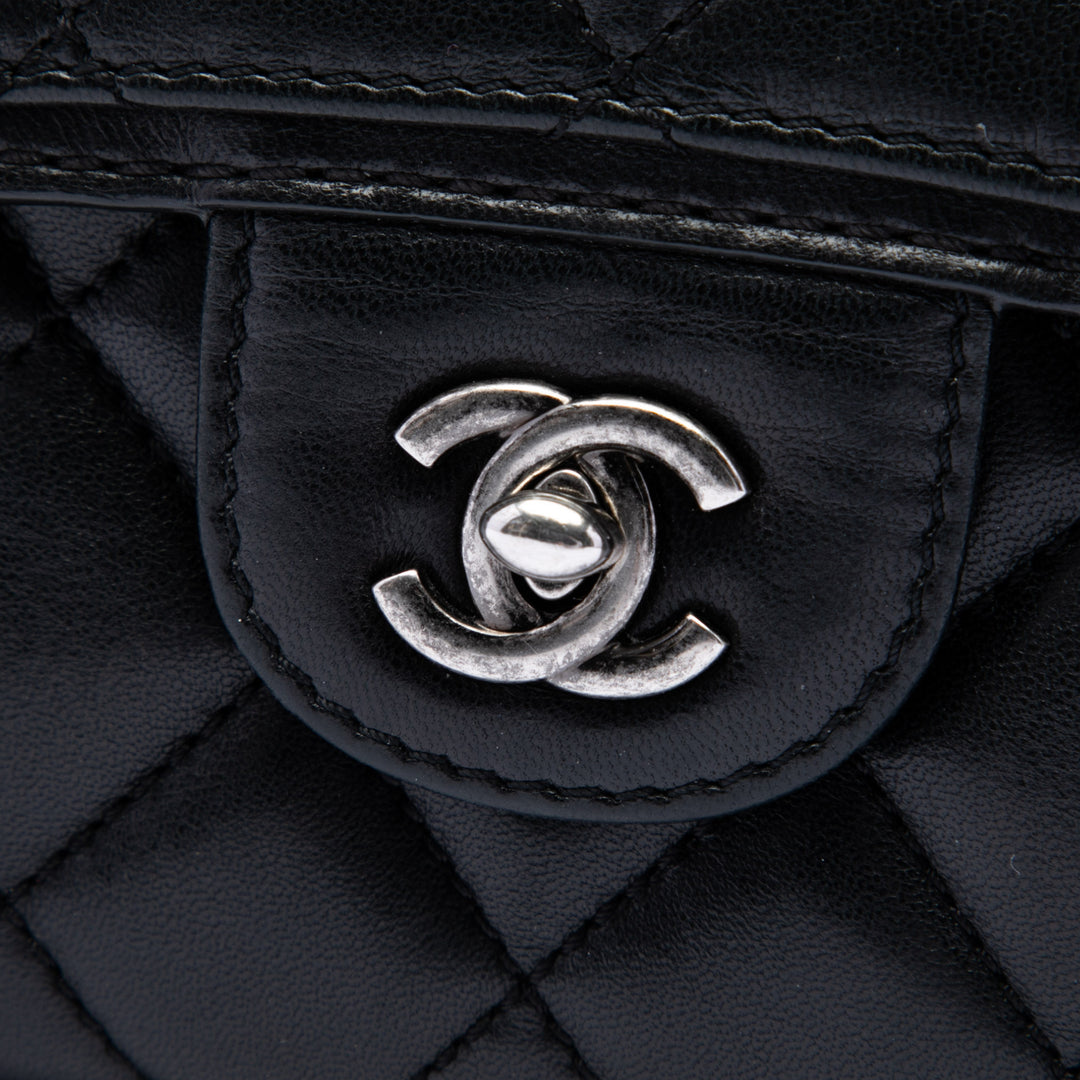 Matelassé Citizen Zippé à rabat Petit Cuir d'agneau Noir