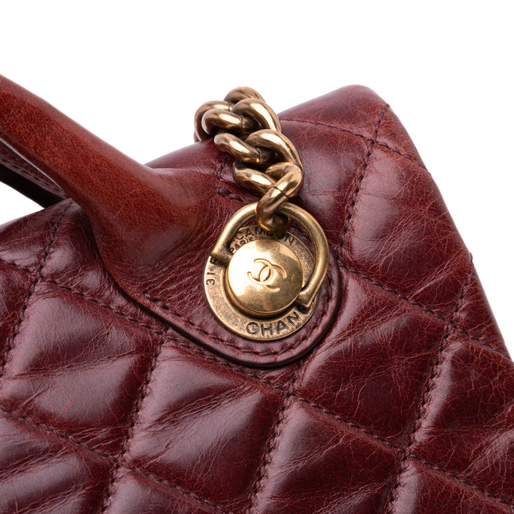 Medium Glazed Calfskin Castle Rock Top Handle Flap Red - Gaby Paris