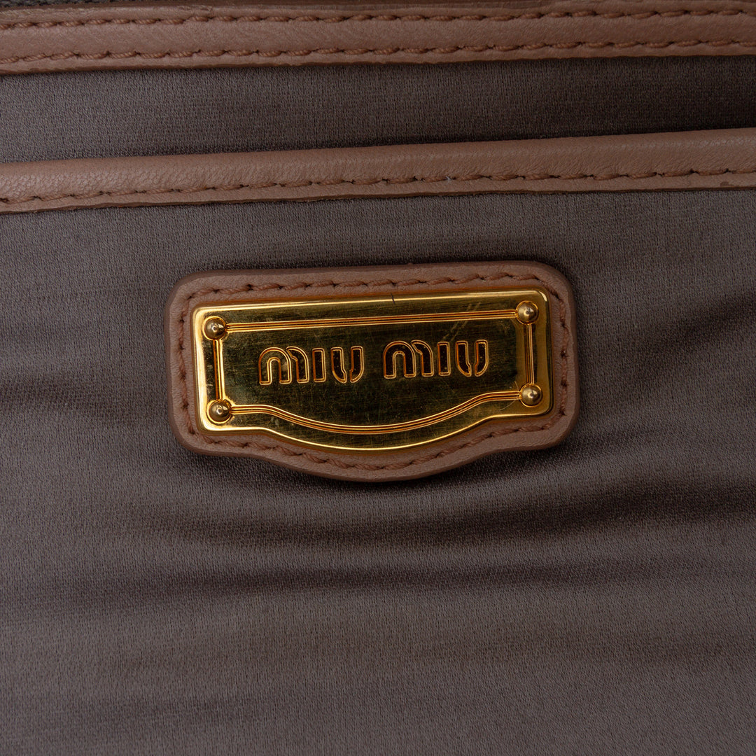 Miu Miu Matelasse Nappa Kiss Lock Pochette on Strap Marron – GABY PARIS Authentique
