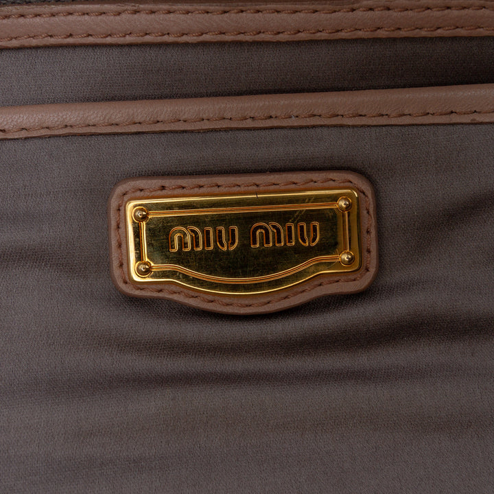 Miu Miu Matelasse Nappa Kiss Lock Pochette on Strap Marron – GABY PARIS Authentique