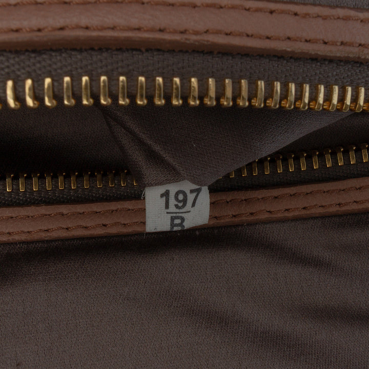 Miu Miu Matelasse Nappa Kiss Lock Pochette on Strap Marron – GABY PARIS Authentique