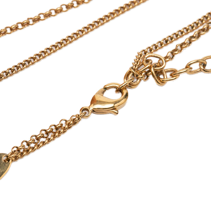 Louis Vuitton plaqué Strass Padlock et Key Pendant Collier Doré – vue 4 – GABY PARIS