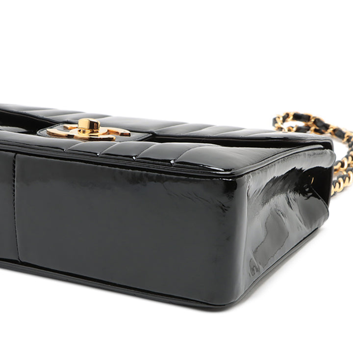 Chanel Jumbo Cuir verni Vertical Quilt Mademoiselle Flap Noir – GABY PARIS Authentique