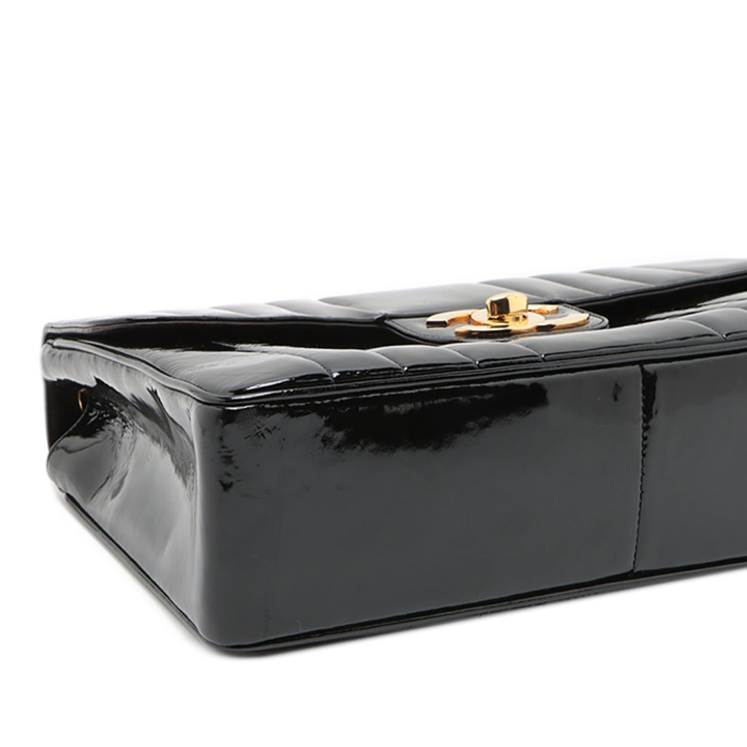 Chanel Jumbo Cuir verni Vertical Quilt Mademoiselle Flap Noir – GABY PARIS Authentique