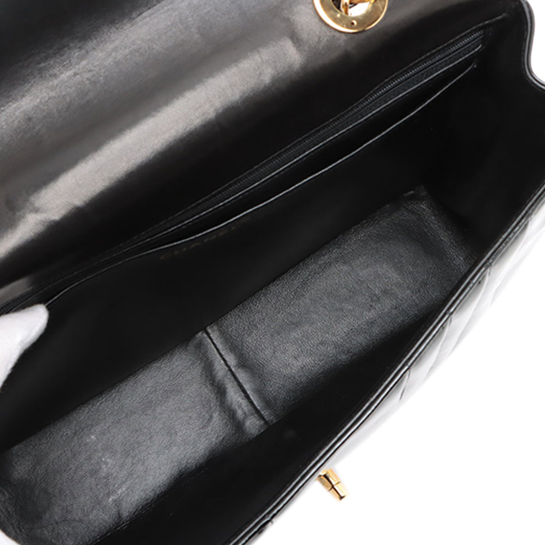 Chanel Jumbo Cuir verni Vertical Quilt Mademoiselle Flap Noir – GABY PARIS Authentique