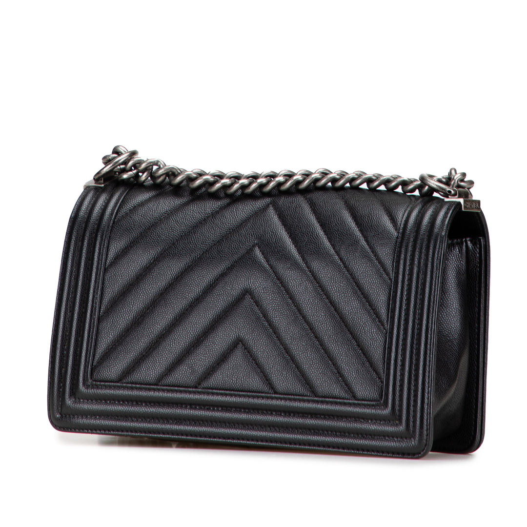 Chanel Old Medium Chevron Caviar Boy Flap Noir – GABY PARIS Authentique