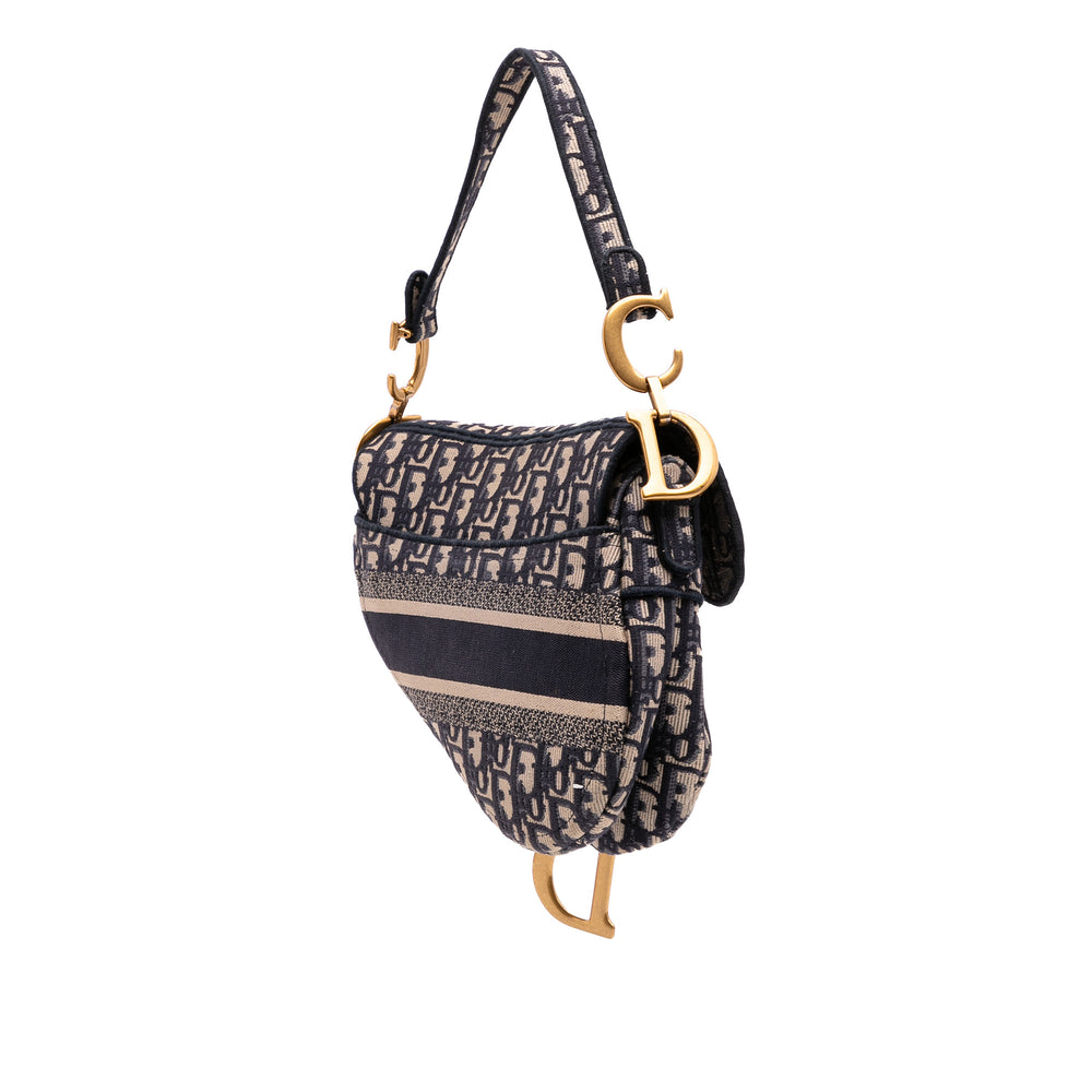 Oblique Embroidered Canvas Saddle Bag Blue - Gaby Paris
