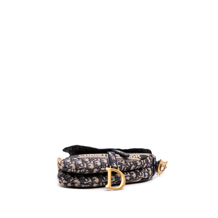 Oblique Embroidered Canvas Saddle Bag Blue - Gaby Paris