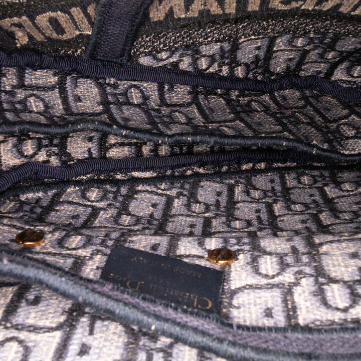 Oblique Embroidered Canvas Saddle Bag Blue - Gaby Paris