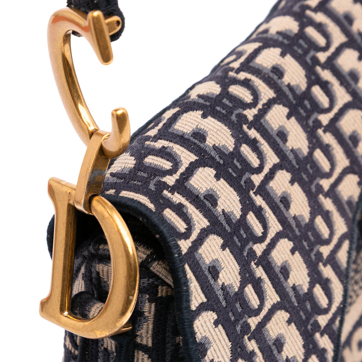 Oblique Embroidered Canvas Saddle Bag Blue - Gaby Paris