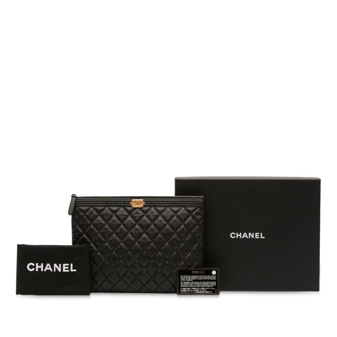 Chanel Matelassé Boy O Étui Pochette Moyen Cuir caviar