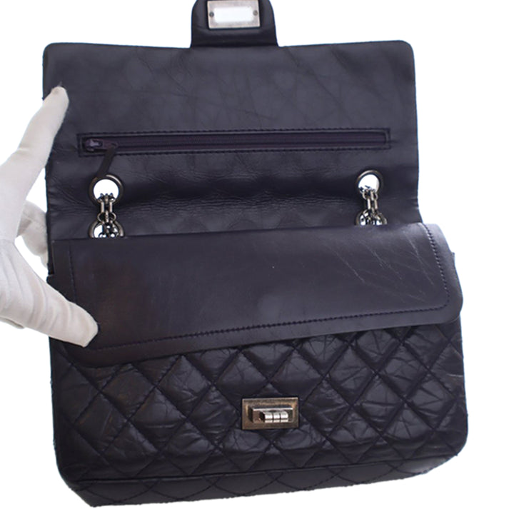 Chanel Matelassé vieilli Cuir de veau Reissue 2.55 Double rabat 225 – GABY PARIS Authentique