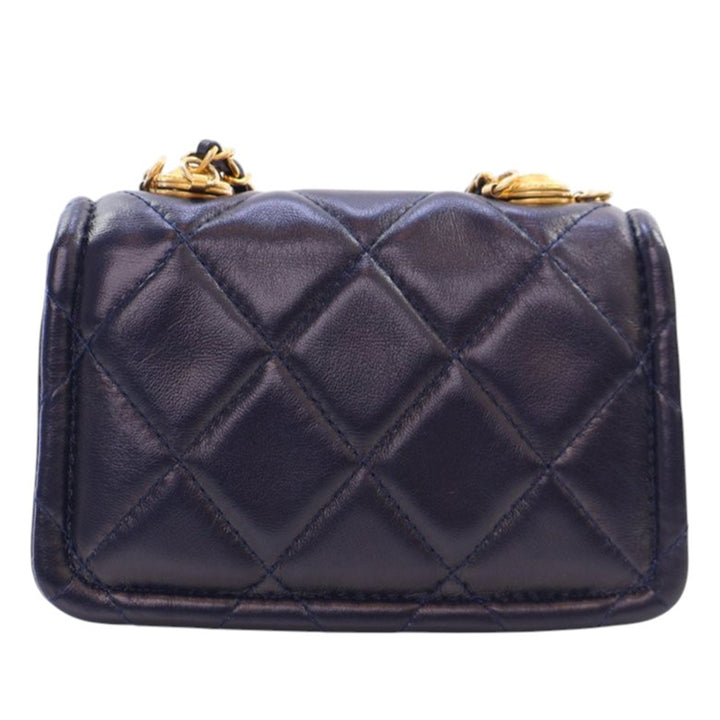 Chanel Mini Quilted Shiny Cuir d’agneau Button On Top Flap Bleu – GABY PARIS Authentique