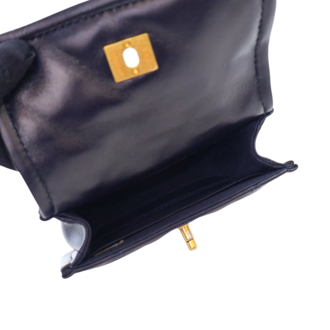 Chanel Mini Quilted Shiny Cuir d’agneau Button On Top Flap Bleu – GABY PARIS Authentique