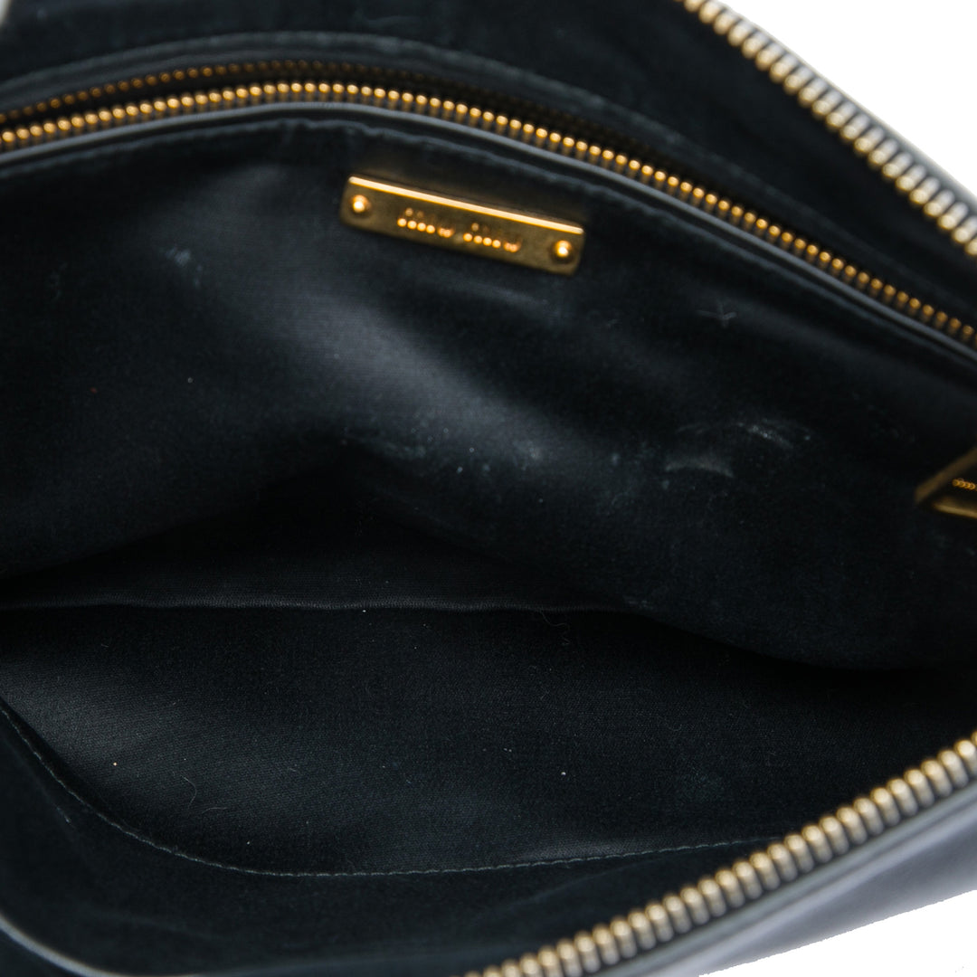 Miu Miu clouté Cuir Zip Pochette