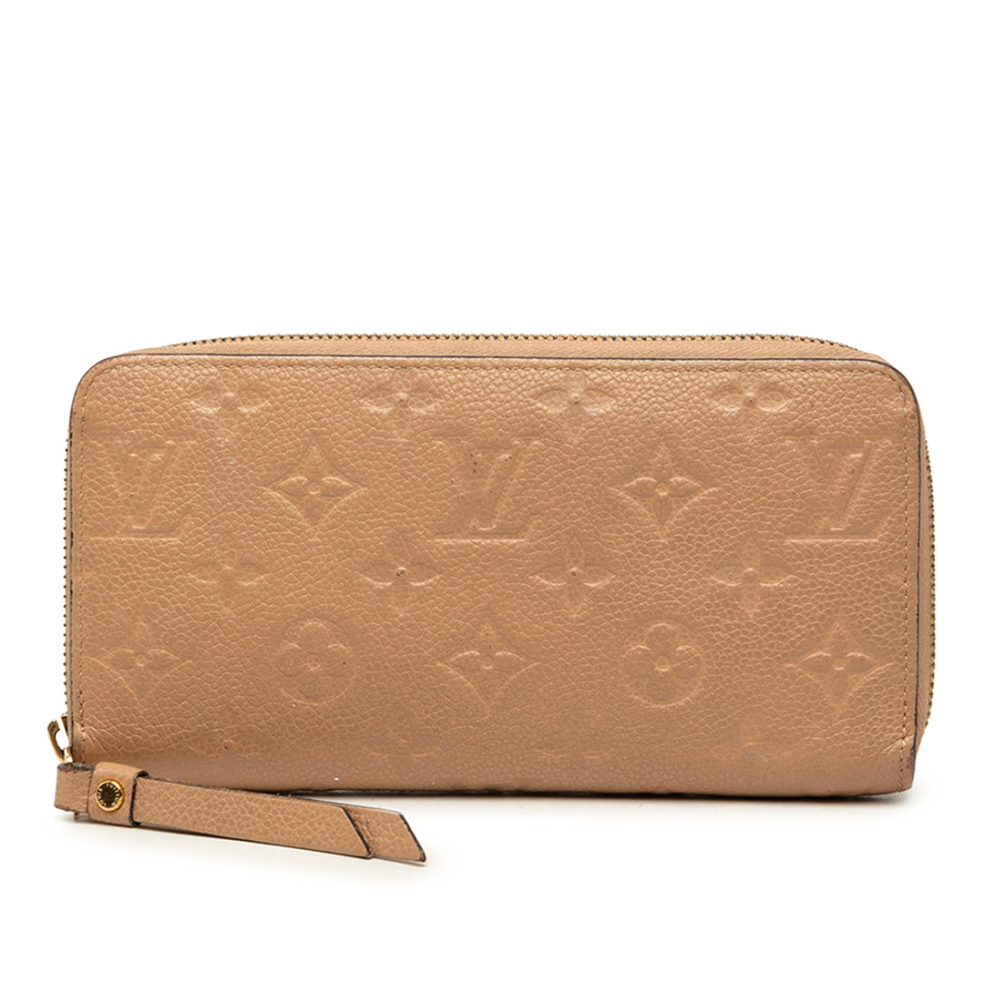 Louis Vuitton Portefeuille Zippy Monogram Empreinte Beige – vue principale – GABY PARIS