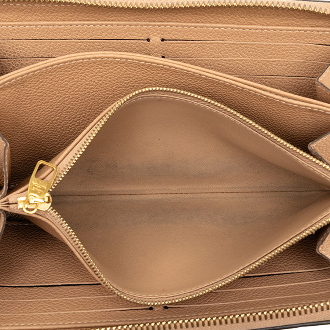 Louis Vuitton Portefeuille Zippy Monogram Empreinte Beige – vue 4 – GABY PARIS