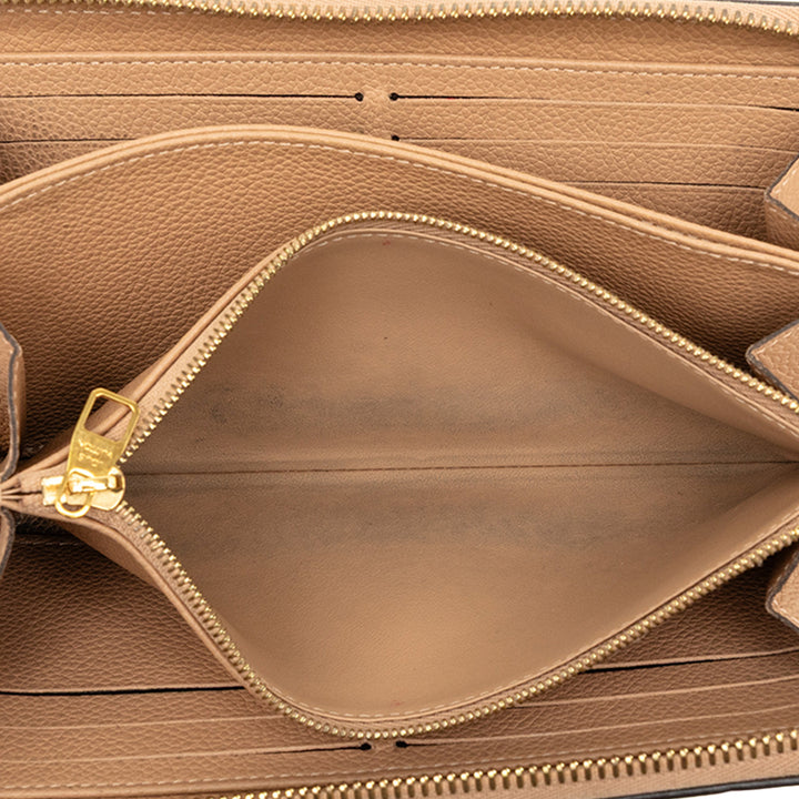 Louis Vuitton Portefeuille Zippy Monogram Empreinte Beige – vue 4 – GABY PARIS