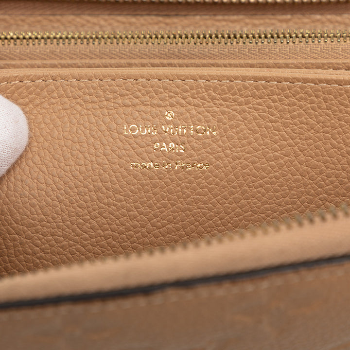 Louis Vuitton Portefeuille Zippy Monogram Empreinte Beige – vue 5 – GABY PARIS