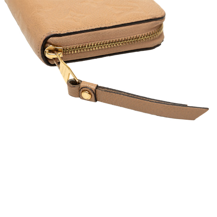 Louis Vuitton Portefeuille Zippy Monogram Empreinte Beige – vue 6 – GABY PARIS