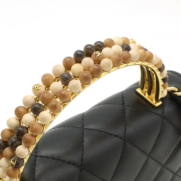 Chanel CC Matelassé Cuir d’agneau Wooden Beads anse supérieure Wallet on Chain