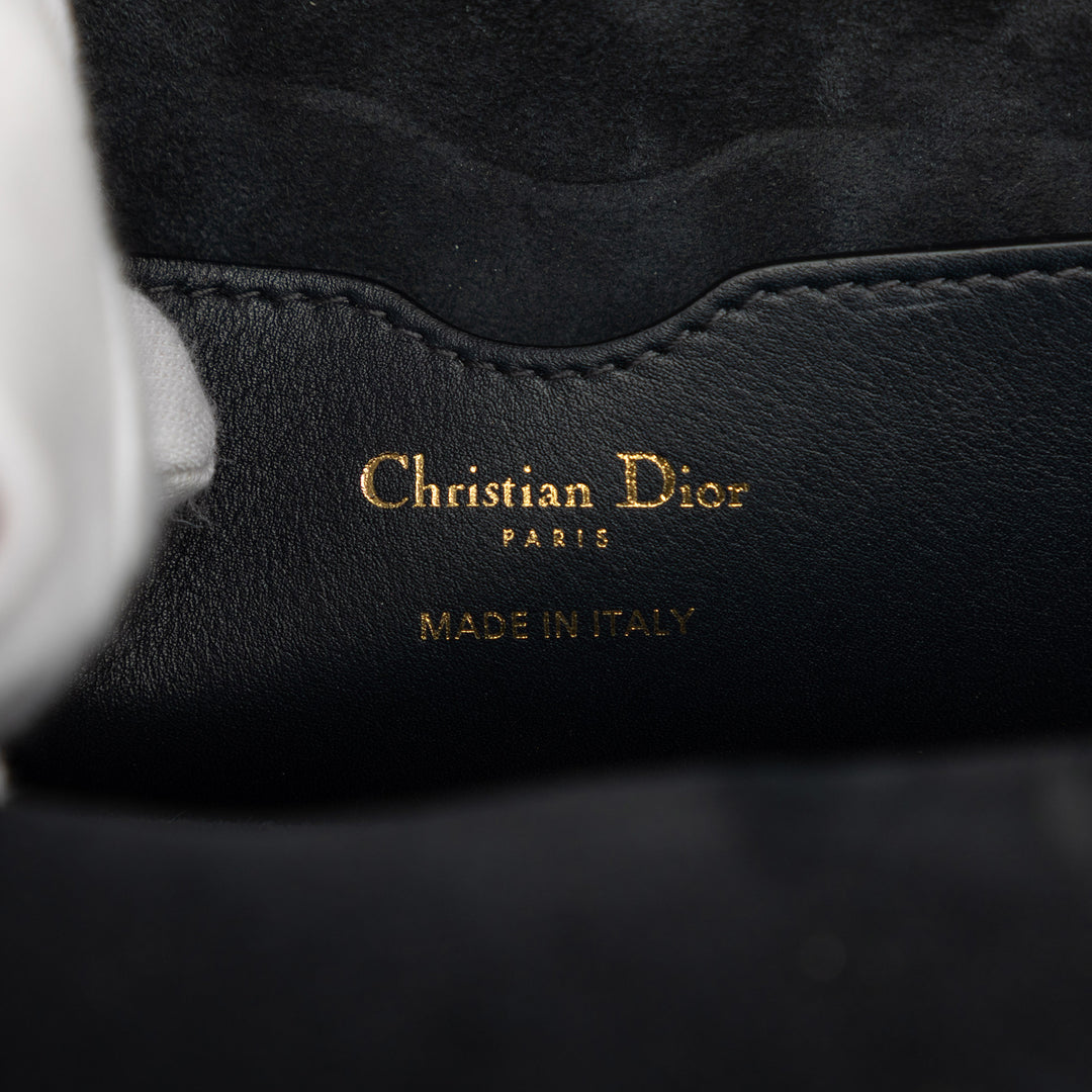 Dioravenue Sac seau Petit Cuir de veau Noir