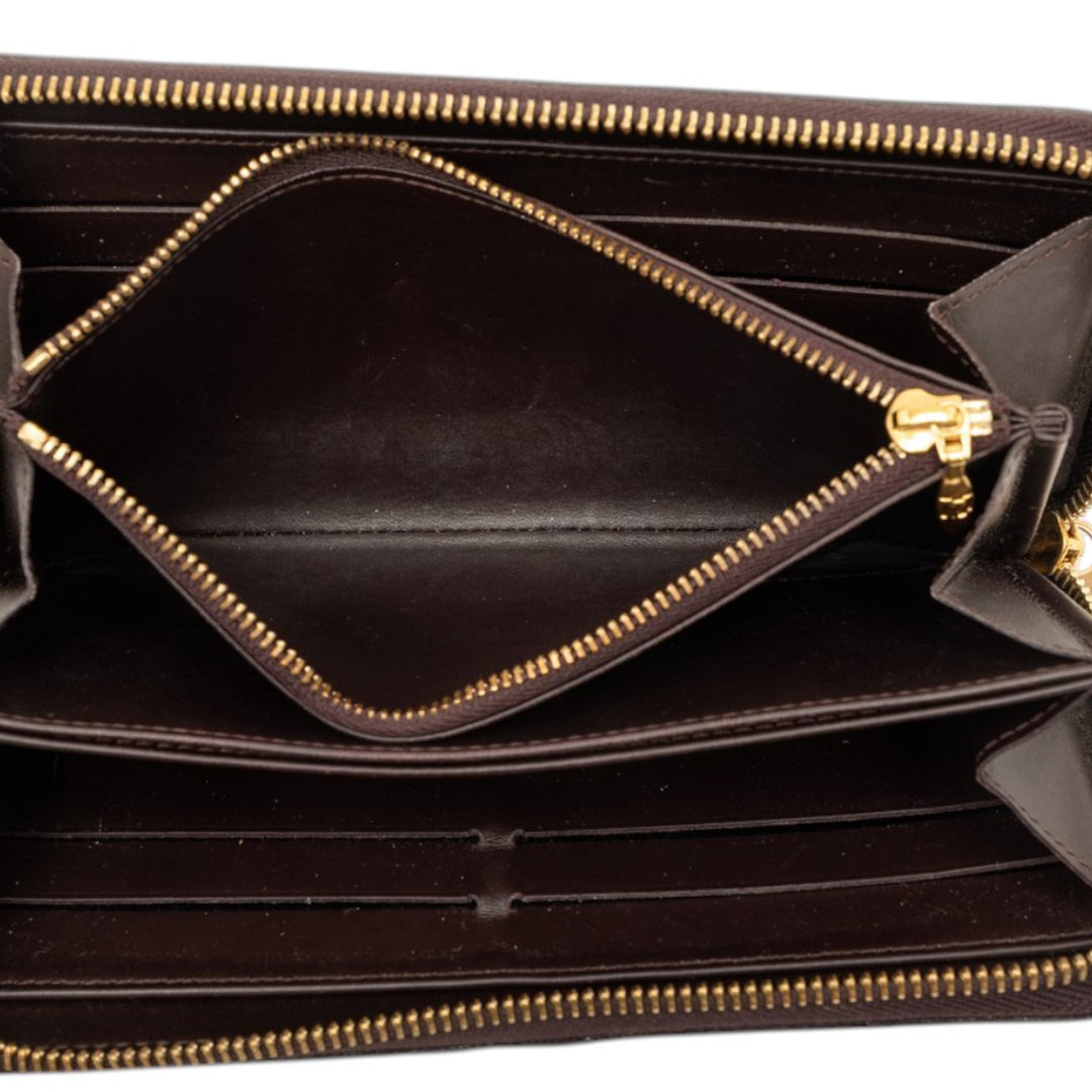 Zippy Portefeuille long Cuir verni Monogram Violet