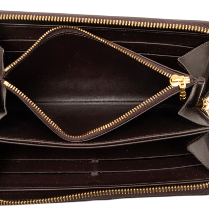 Zippy Portefeuille long Cuir verni Monogram Violet