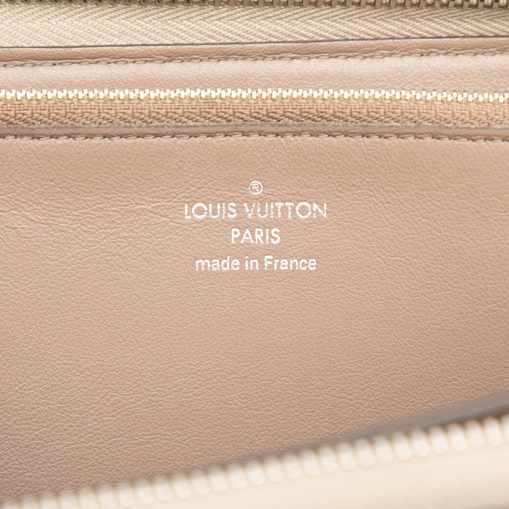 Louis Vuitton Taurillon Comete Portefeuille