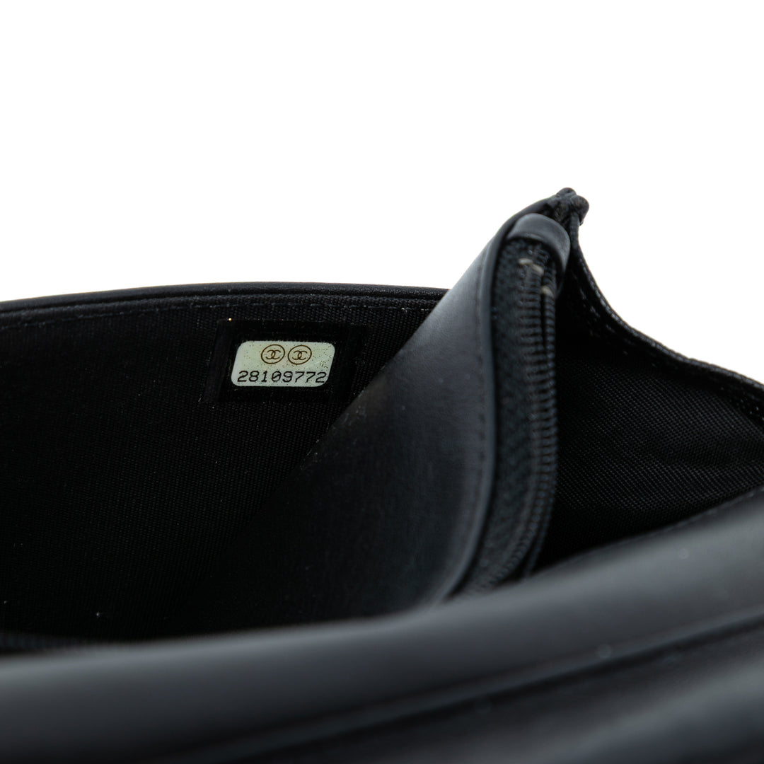 Chanel Matelassé Boy Wallet on Chain Cuir caviar Noir
