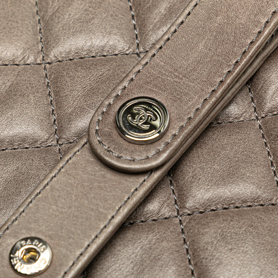 CC Quilted Aged Calfskin Round Clutch Brown - Gaby Paris