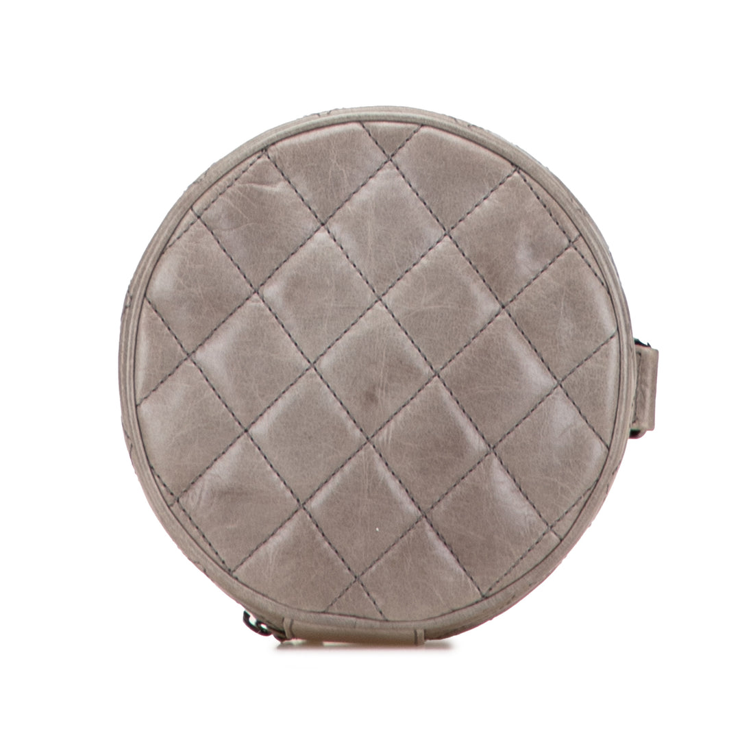 CC Quilted Aged Calfskin Round Clutch Brown - Gaby Paris