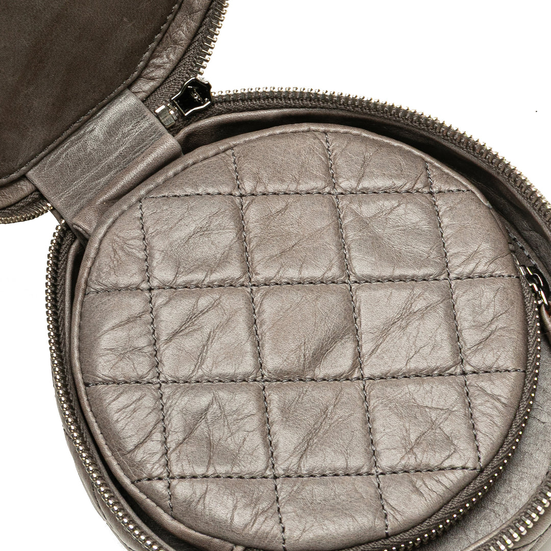 CC Quilted Aged Calfskin Round Clutch Brown - Gaby Paris