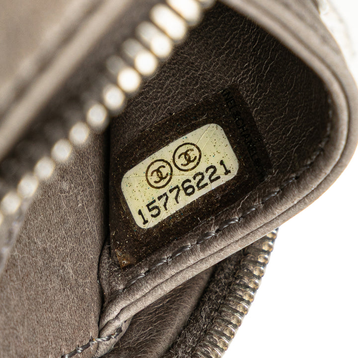 CC Quilted Aged Calfskin Round Clutch Brown - Gaby Paris