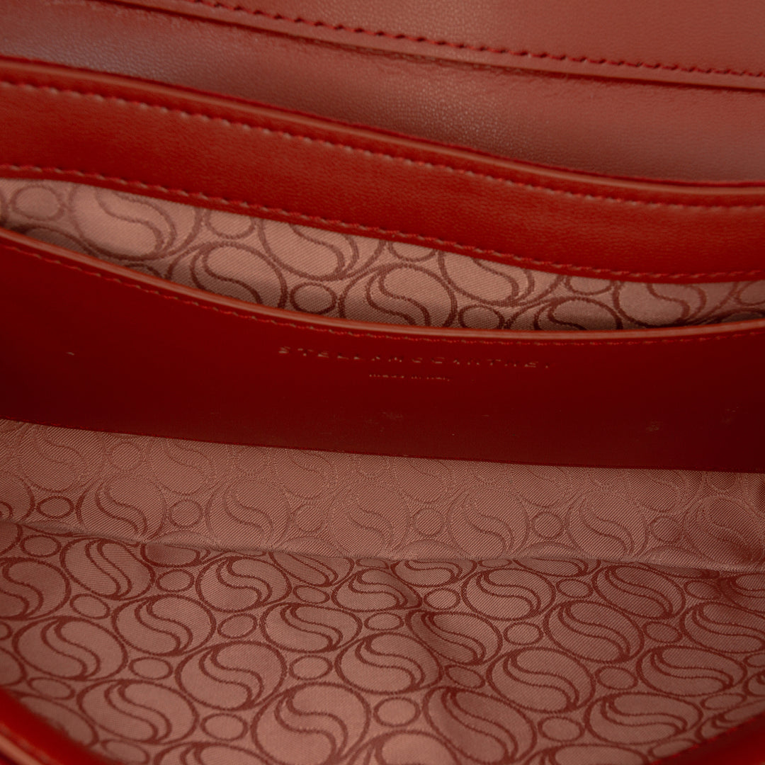Faux S Wave Padded Sac Rouge