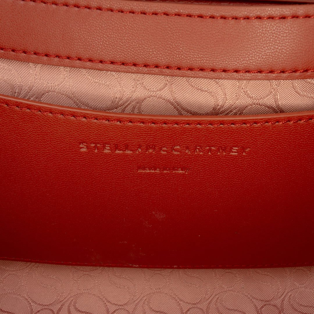 Faux S Wave Padded Sac Rouge