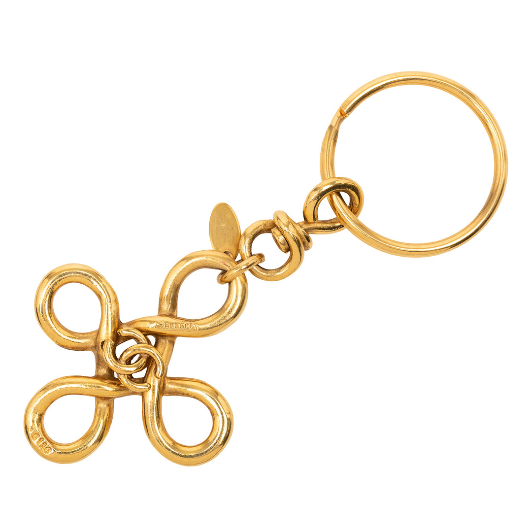 Chanel plaqué CC Clover Cross Keychain – GABY PARIS Authentique