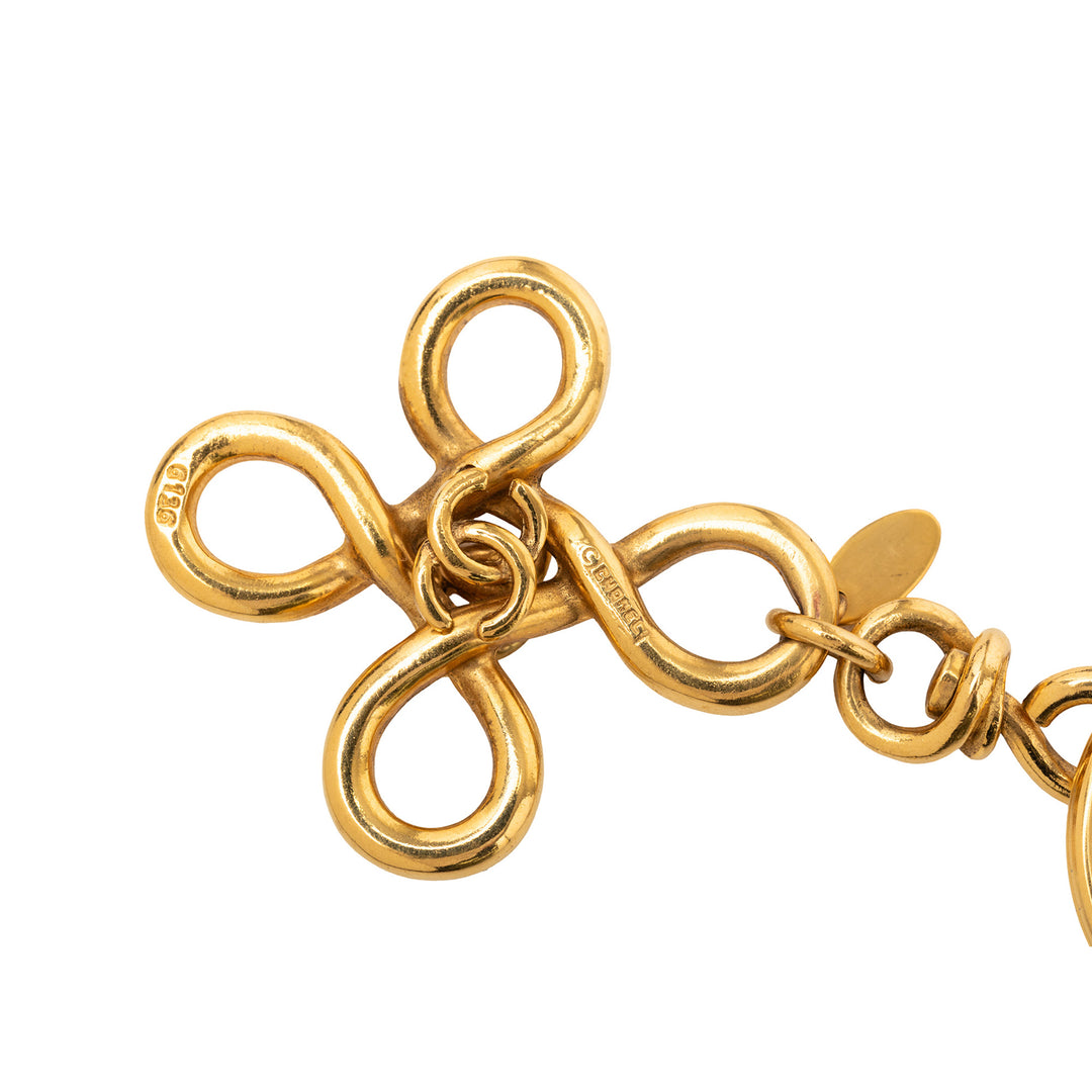 Chanel plaqué CC Clover Cross Keychain – GABY PARIS Authentique