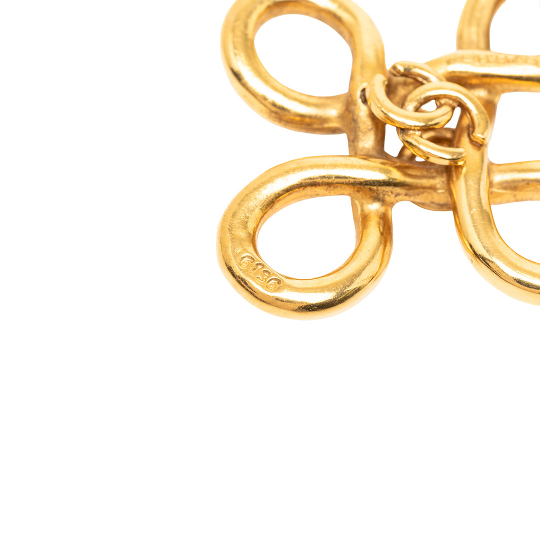 Chanel plaqué CC Clover Cross Keychain – GABY PARIS Authentique