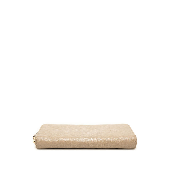 Zippy Portefeuille long Monogram Empreinte Beige