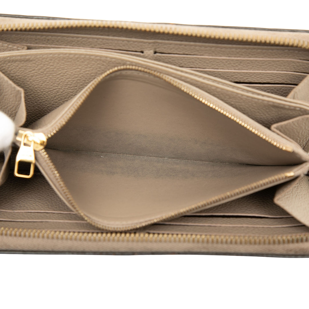 Zippy Portefeuille long Monogram Empreinte Beige