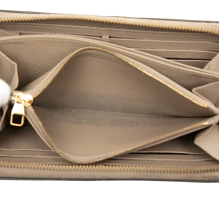 Zippy Portefeuille long Monogram Empreinte Beige
