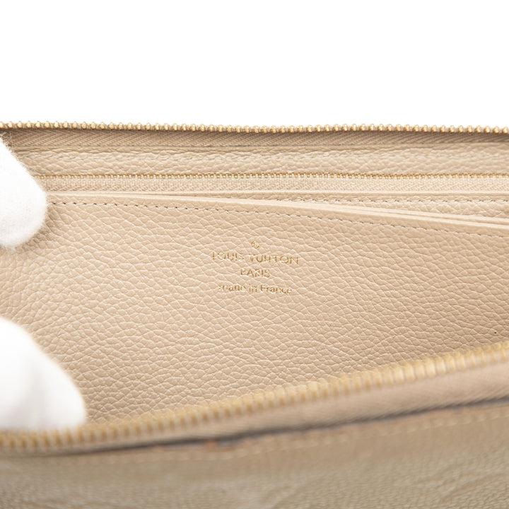 Zippy Portefeuille long Monogram Empreinte Beige