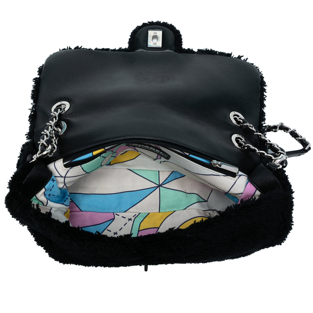 Chanel Jumbo Quilted Shearling Simple rabat Noir – GABY PARIS Authentique