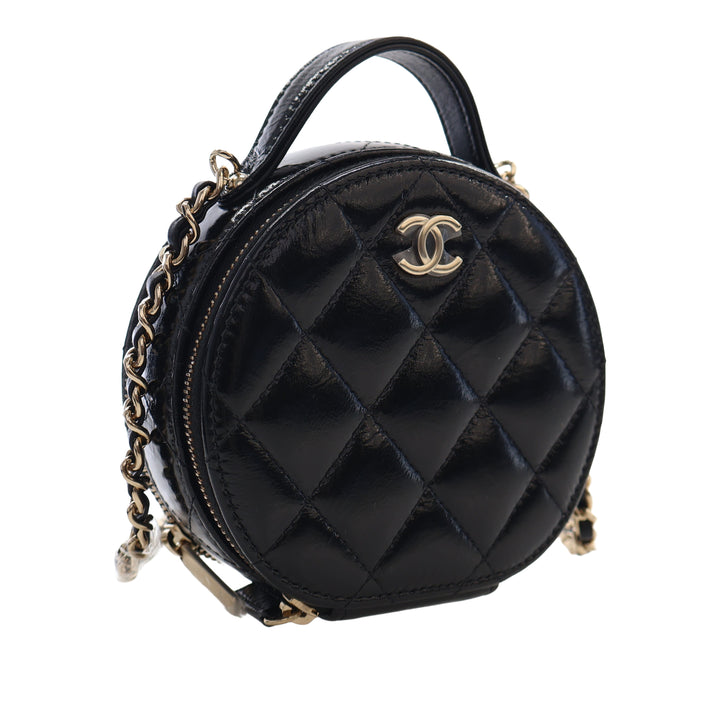 Chanel Matelassé Glazed Cuir d’agneau Handle With Care Rond Vanity avec chaîne